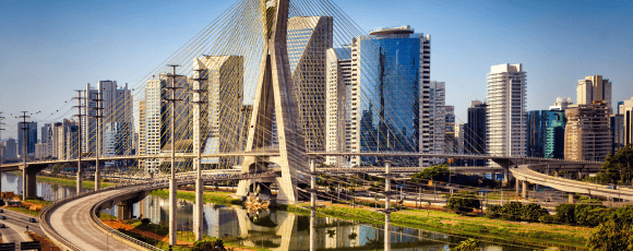 Aerial view of Recife, Brazil, featuring its coastline and urban skyline.